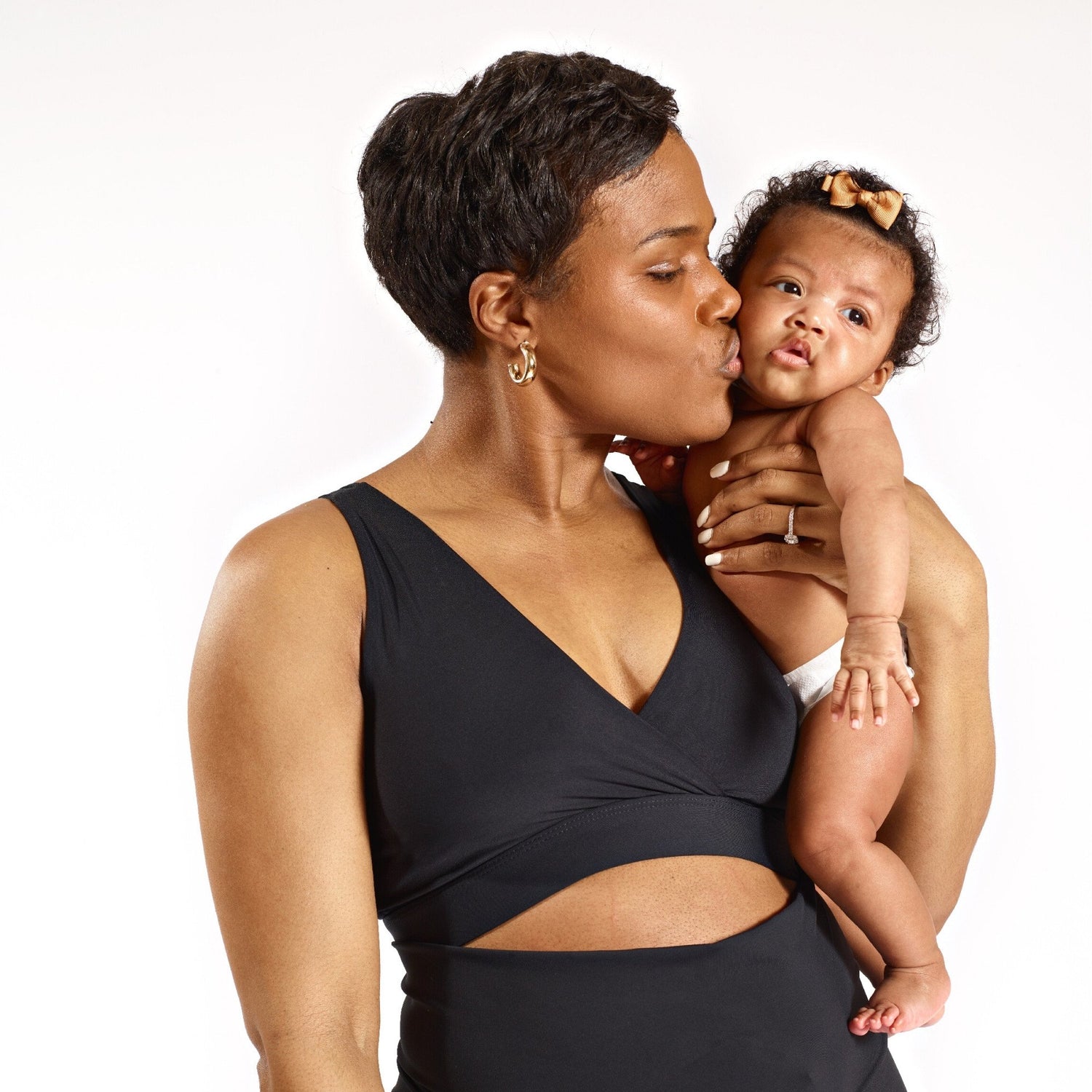 Woman with baby in FourthWear Postpartum Recovery Bralette